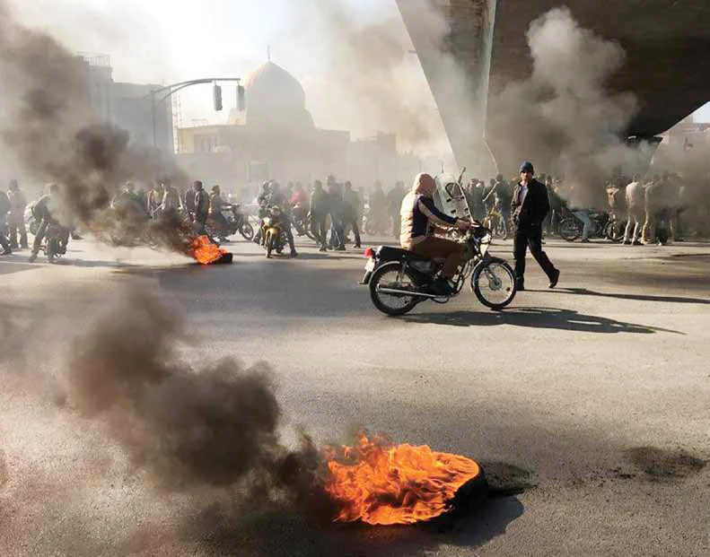 Violent protests grip major Iranian cities over gas price rise