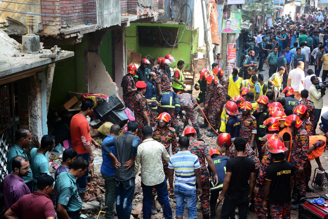 Rescue workers are seen at the site of a gas pipeline explosion in the port city of Chittagong, Bangladesh, November 17, 2019. (Reuters)
