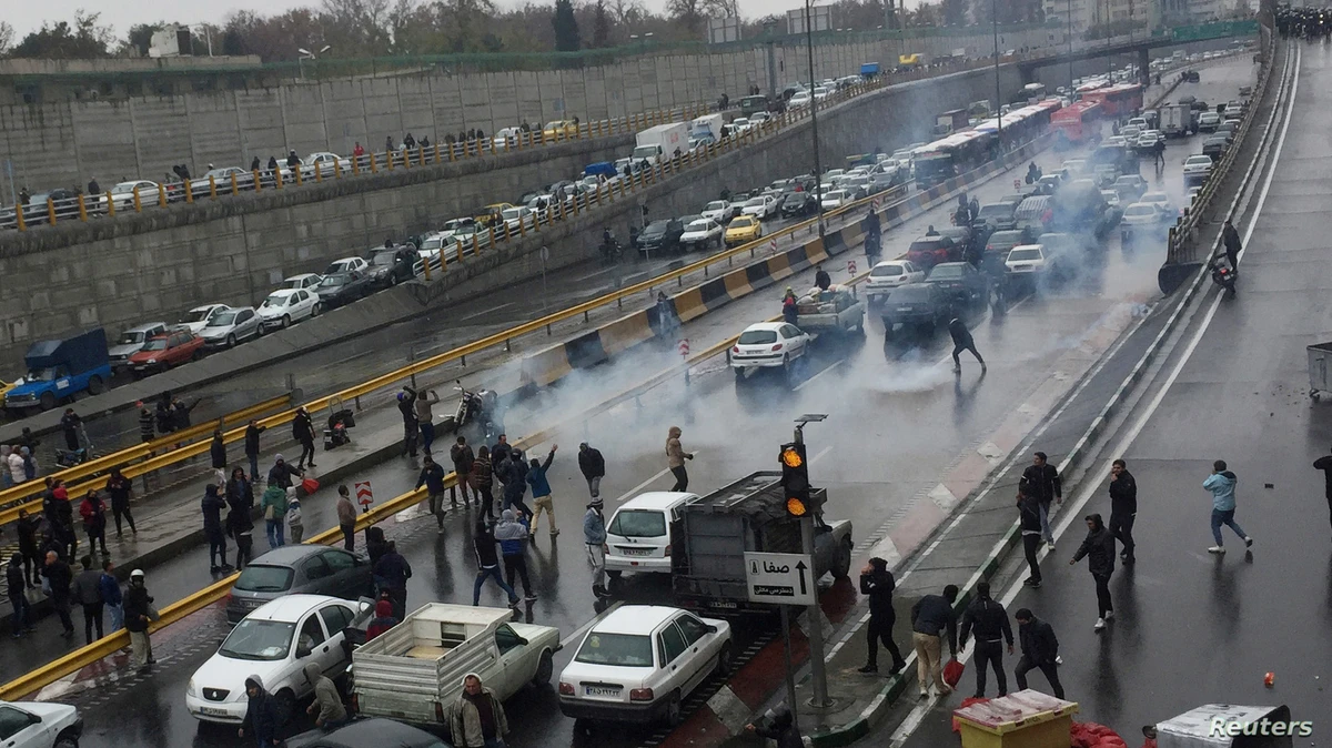 People protest against increased petrol prices on a motorway in Tehran, Iran on November 16, 2019. ( Reuters Photo)