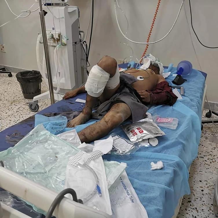 A man injured in an airstrike that hit a biscuit factory is treated in a hospital in the capital, Tripoli, Libya, Monday, Nov. 18, 2019. (AP)