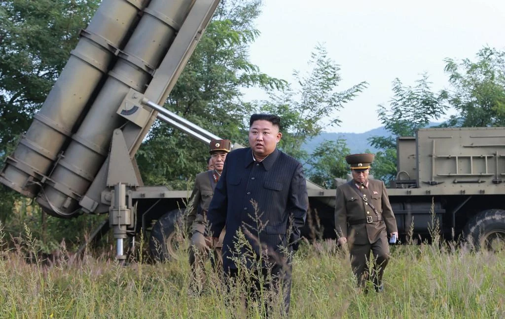 North Korean leader Kim Jong Un attends the testing of a ‘super-large multiple rocket launcher’ at an undisclosed location in North Korea in this on September 10, 2019 photo. (KCNA via KNS/AFP)