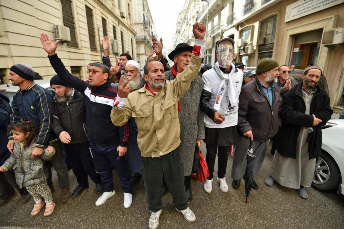 Algerians chant slogans during a demonstration on November 18, 2019. (AFP)