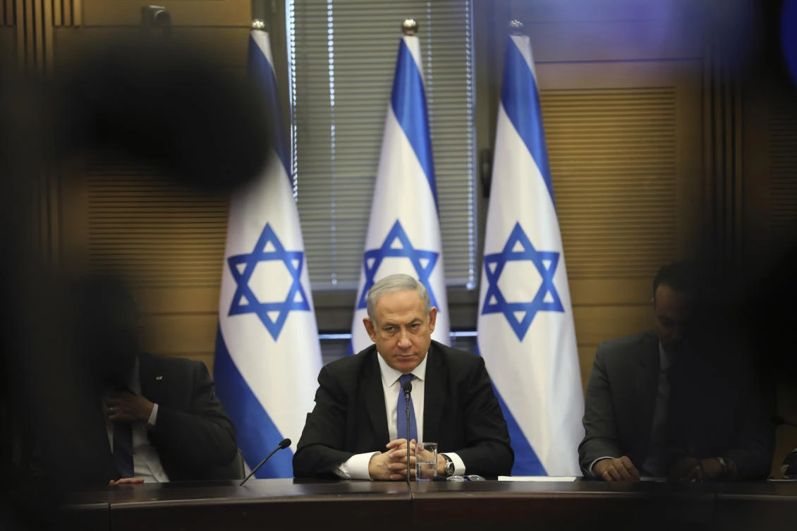 Israeli Prime Minister Benjamin Netanyahu speaks during an extended faction meeting of the right-wing bloc members at the Knesset, in Jerusalem, Wednesday, Nov. 20, 2019. (AP)