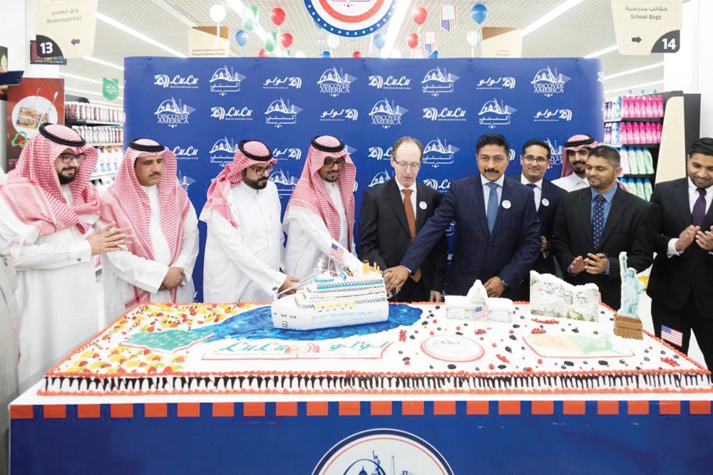US Agriculture Attache Alan Hallman with Shehim Mohammed, director of LuLu Hypermarket, cutting cake after the festival opening. (Photo/Supplied)