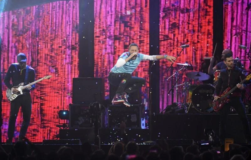 Chris Martin said, ‘Our dream is to have a show with no single-use plastic, to have it be largely solar-powered.’ (Reuters)