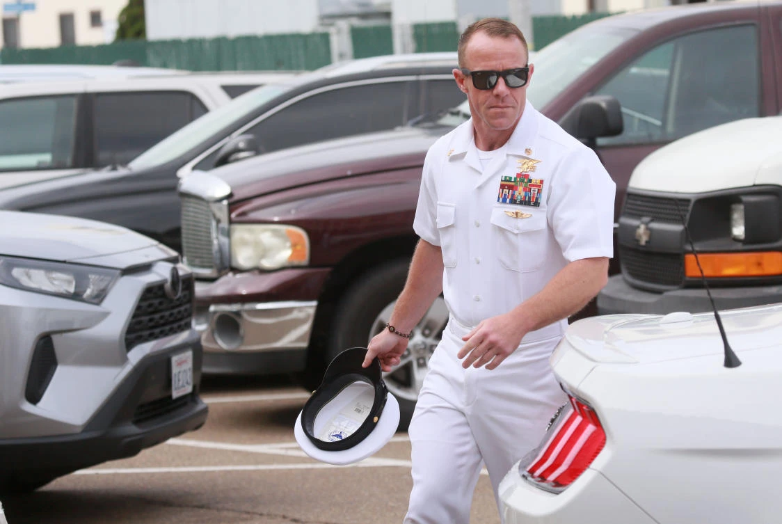 Trump vows US Navy will not oust commando who posed with corpse from SEALs
