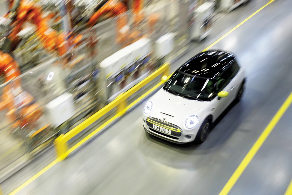The new Mini electric car is unveiled at the BMW group plant near Oxford, UK, in July. The first electric Mini will go into full production at the end of 2019. (AFP)