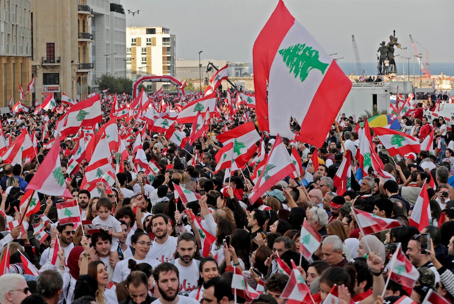 Lebanese protesters, embattled leaders hold separate national day celebrations