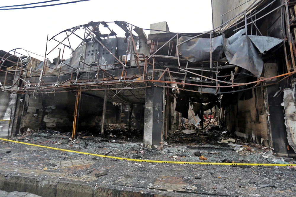 Shops destroyed during demonstrations against petrol price hikes, in Shahriar, west of Tehran. (AFP)