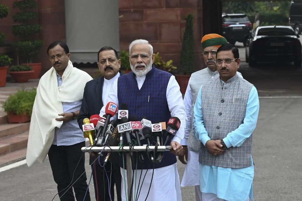 The Hindu nationalist Bharatiya Janata Party of Indian Prime Minister Narendra Modi, center, made an unexpected comeback to power Saturday in wealthy Maharashtra state. (AFP)