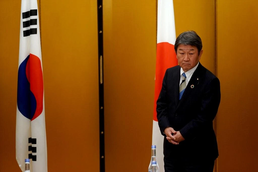 Japan’s foreign minister Toshimitsu Motegi waits to meet with his South Korean counterpart Kang Kyung-wha before a bilateral meeting at the G20 Foreign Ministers’ meeting in Nagoya on Saturday, November 23, 2019. (AFP)