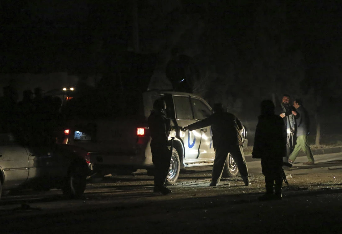 Afghan security personnel inspect the site of an explosion in Kabul, Afghanistan, Sunday, Nov. 24, 2019. (AP)