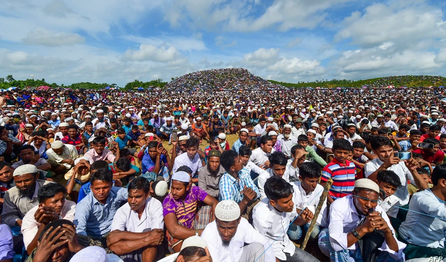 Rohingya refugees attend a ceremony to mark the second anniversary of the exodus at the Kutupalong refugee camp in Ukhia, August 25, 2019. (AFP/File)