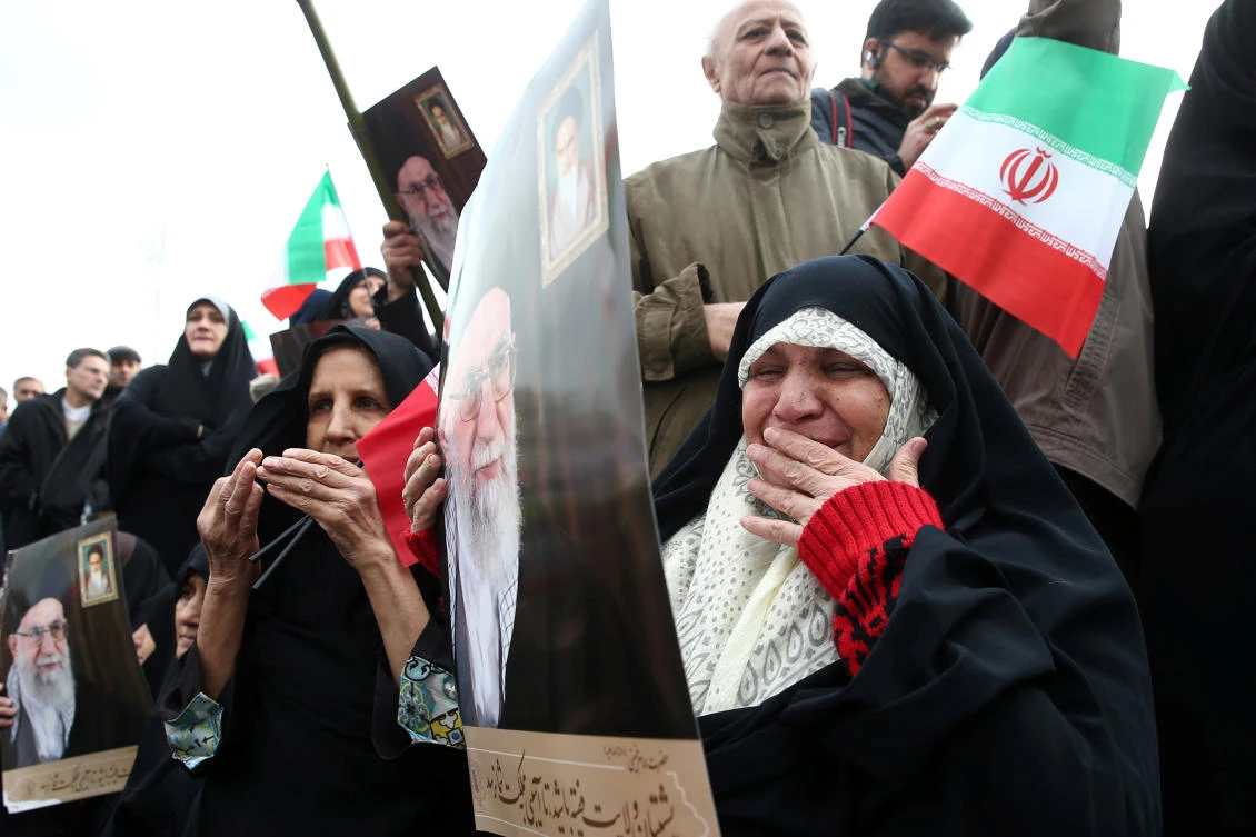 An Iranian pro-government protester reacts as she attends a demonstration in Tehran, Iran November 25, 2019. (Reuters)