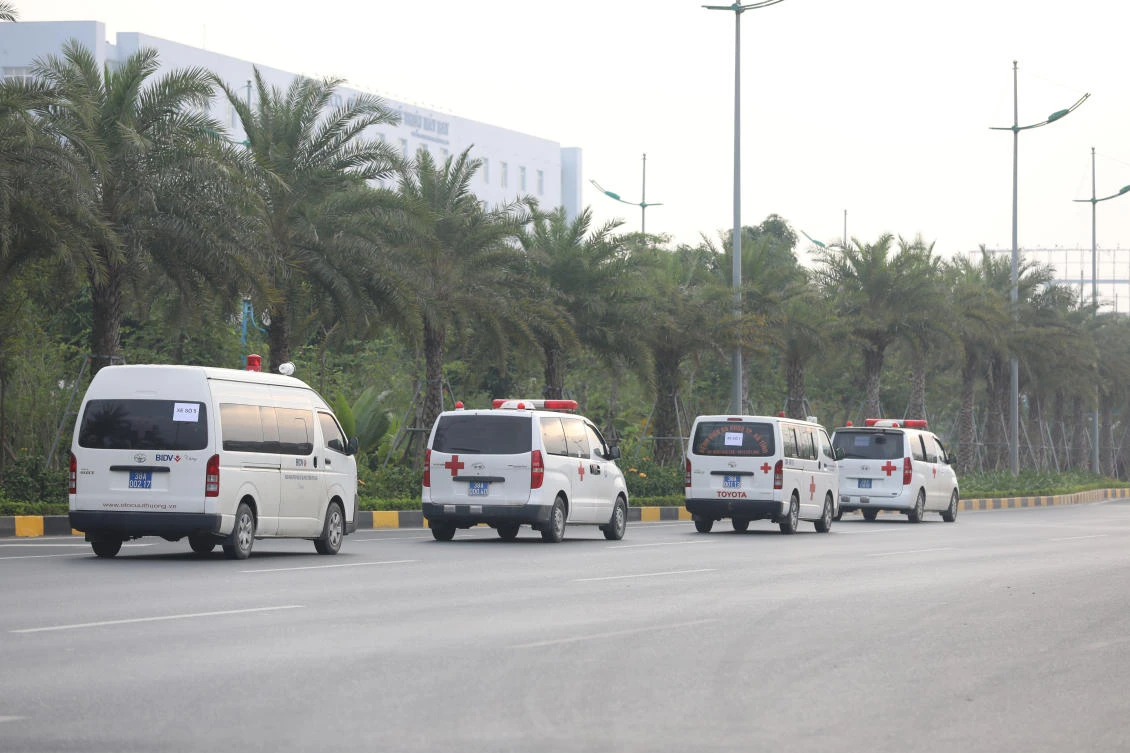 Ambulances from Ha Tinh province carry some of the bodies discovered in a refrigerated lorry in an industrial state in Essex, east of London, on October 23. (Reuters)