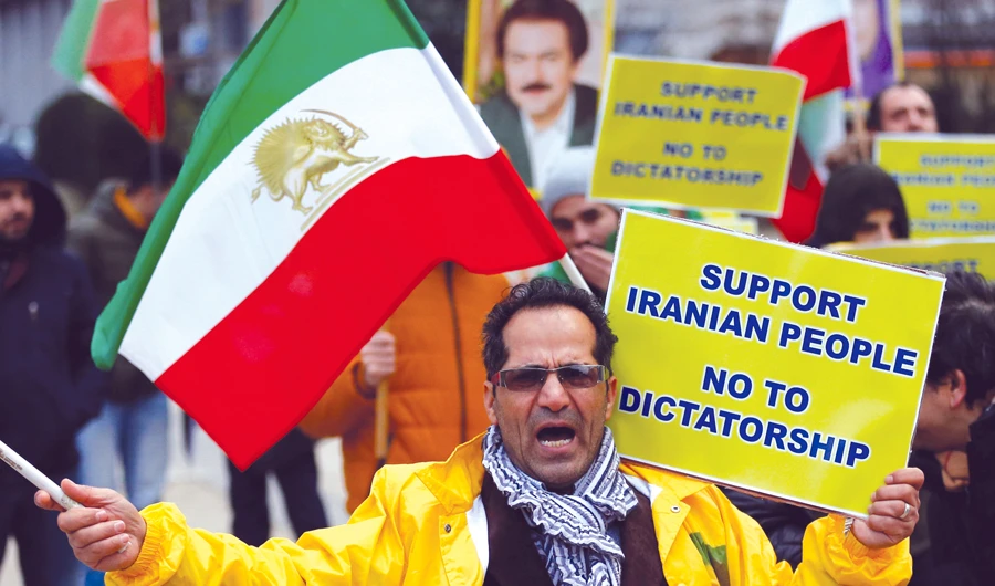 An Iranian protester chants slogans against Tehran in Brussels, Belgium. (AP)