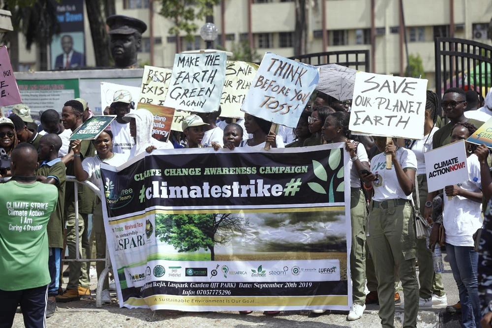 Tens of thousands rally in Europe, Asia before UN climate summit