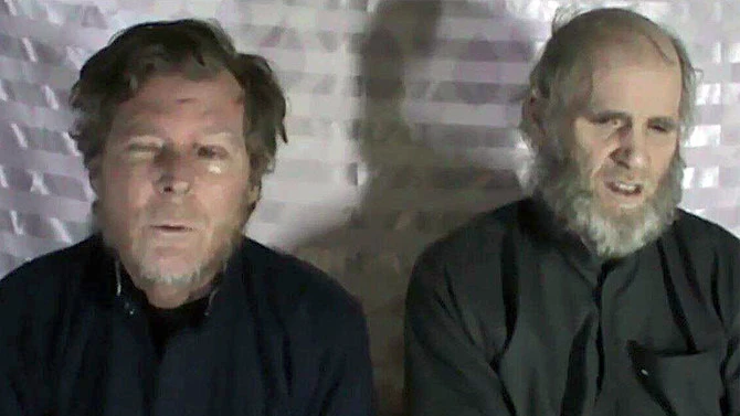 This screengrab taken from a YouTube video shows Kevin King, left, an American national, and Tim Weeks, Australian national who were kidnapped by the Taliban in Kabul, 2016. (Photo courtesy: YouTube/Screengrab)