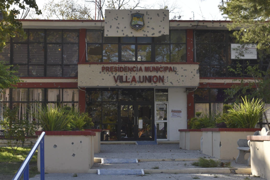 The Villa Union city hall is riddled with bullet holes after a gunbattle between Mexican security forces and suspected cartel gunmen on Saturday, Nov. 30, 2019. (AP)