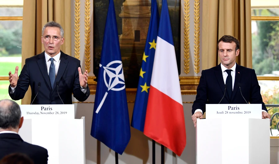 French President Emmanuel Macron and NATO Secretary-General Jens Stoltenberg address a recent press conference at the Elysee Palace in Paris. (AP)