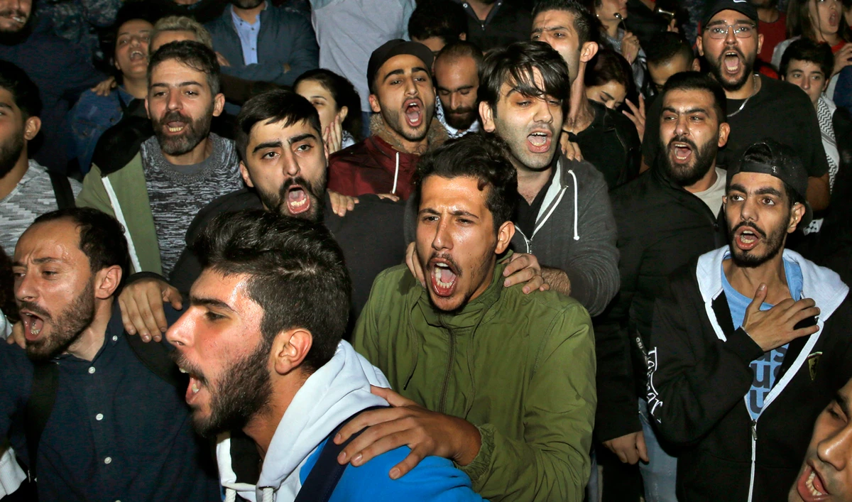 Economic and political experts have warned that if the economic downturn continues, Lebanon will be facing further social crises. (AP)