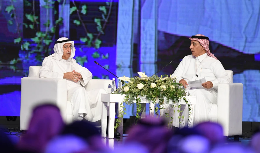 Fahd Al-Mubarak, minister of state, left, with moderator Talat Zaki Hafiz at the Saudi Media Forum in Riyadh on Monday. (AN photo by Basheer Saleh)
