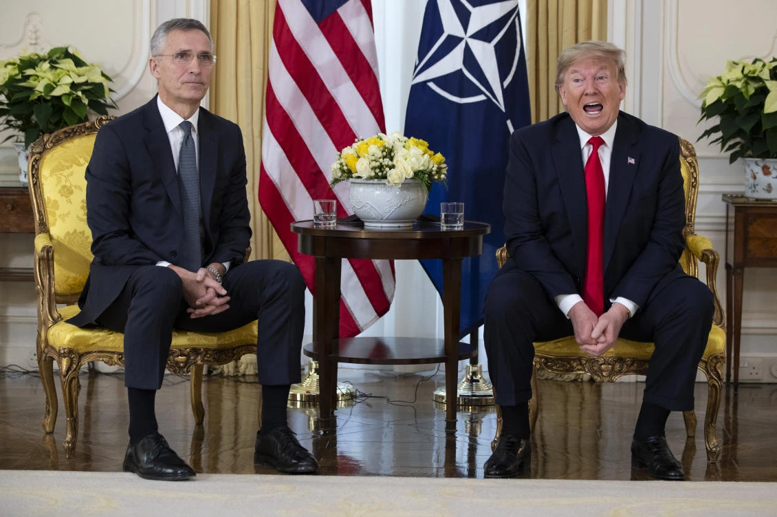 U.S. President Donald Trump speaks during a meeting with NATO Secretary General, Jens Stoltenberg at Winfield House in London on Tuesday. (AP)
