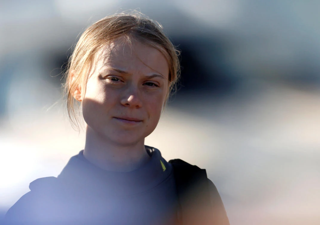 Climate change activist Greta Thunberg looks on upon her arrival at Santo Amaro port in Lisbon, Portugal December 3, 2019. (Reuters)
