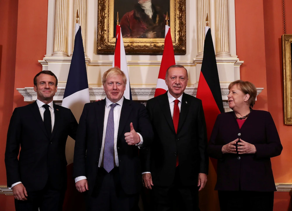Emmanuel Macron directly linked Turkey to Daesh fighters ahead of the NATO summit. (AFP)