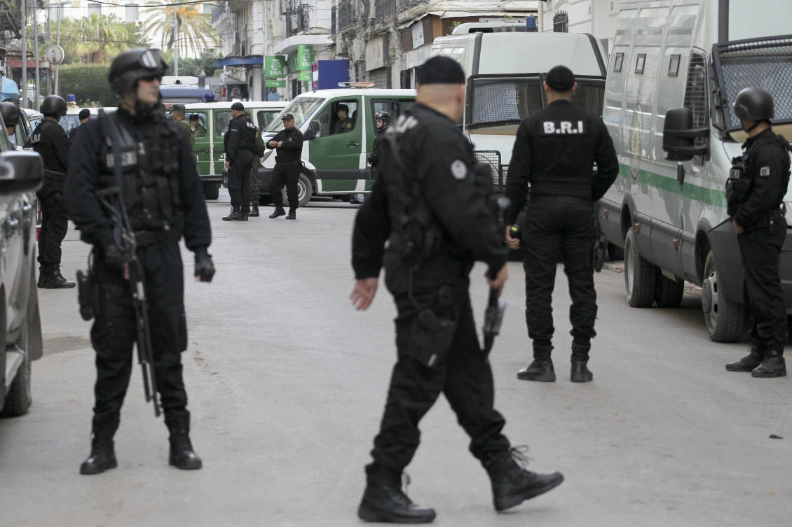 Algerian security forces guard the courtroom as former Algerian Prime Ministers Ahmed Ouyahia and Abdelmalek Sellal face corruption charges, Wednesday, Dec.4, 2019 in Algiers. (AP)
