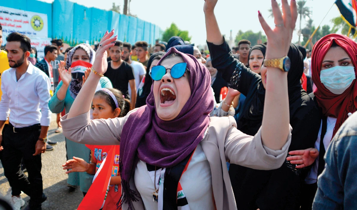 An Iraqi protester shouting slogans during an anti-government demonstration in the southern city of Diwaniyah, near the city of Najaf. (AFP)