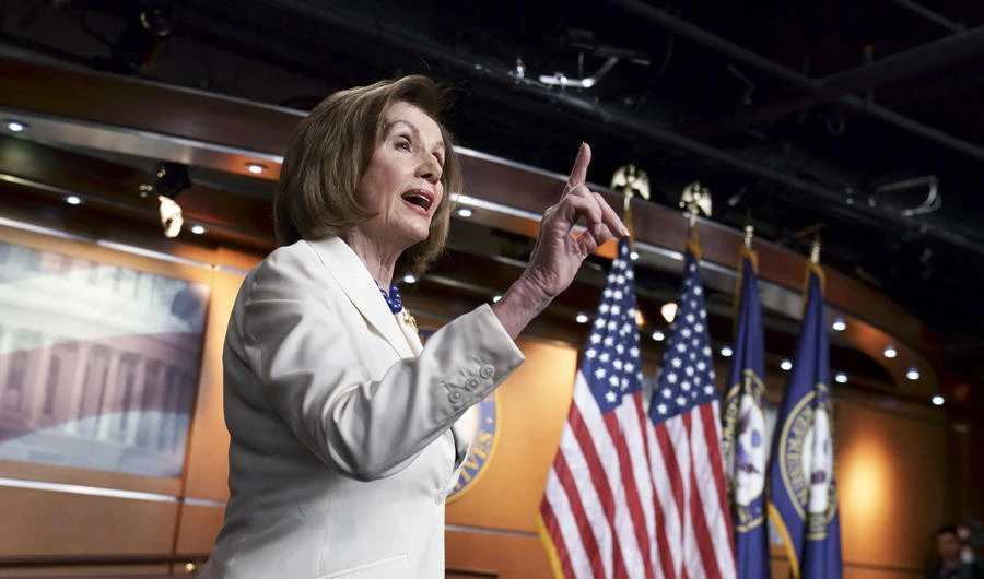 Speaker of the House Nancy Pelosi responds forcefully to a question from a reporter who asked if she hated President Trump, after announcing earlier that the House is moving forward to draft articles of impeachment against Trump, at the Capitol in Washington, on Dec. 5, 2019. (AP Photo/J. Scott Applewhite)