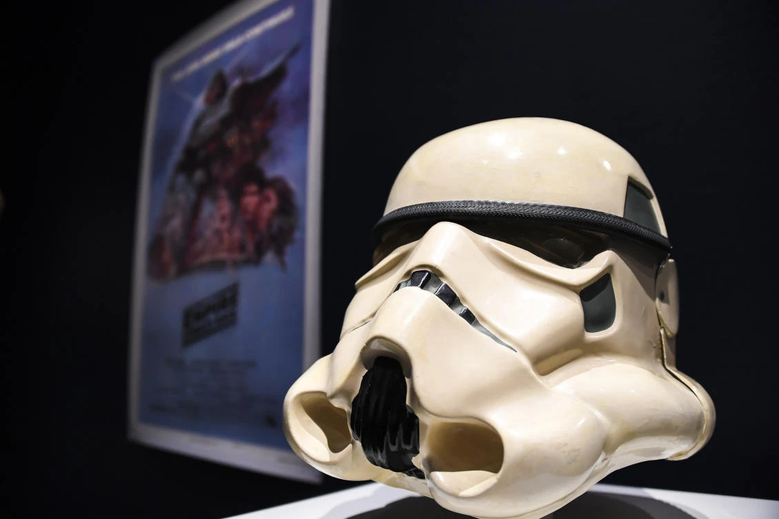 The prototype of an Imperial Stormtrooper helmet of 1976 is displayed at Sotheby's, as part of the Star Wars auction in London, Friday, Dec. 6, 2019. (AP/Alberto Pezzali)