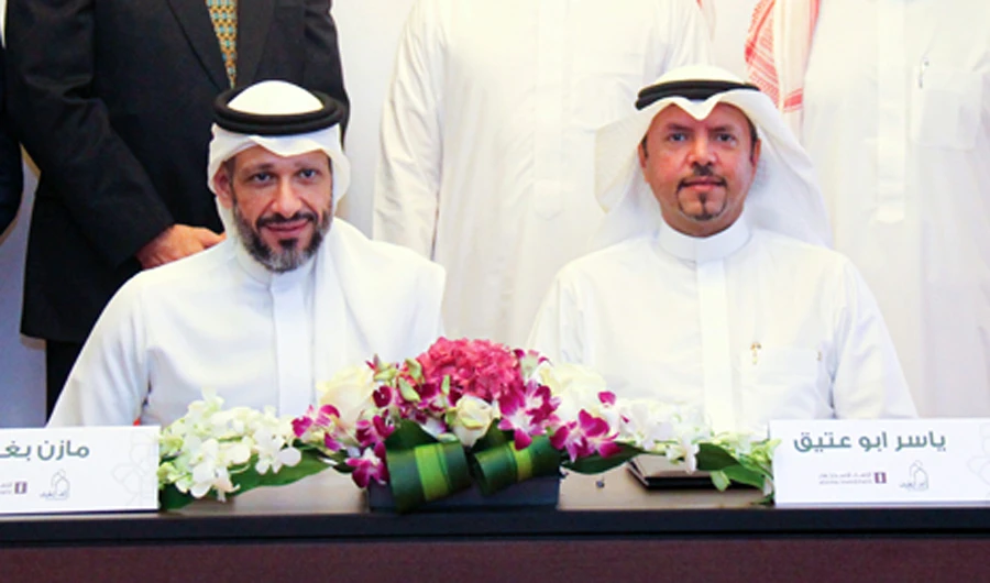 Acting CEO of Alinma Investment Mazin bin Fawaz Baghdadi, left, and Yasser Abuateek, CEO of UAQ, announced the successful completion of the launch of the Makkah Real Estate Development Funds, with an investment value exceeding SR17 billion.