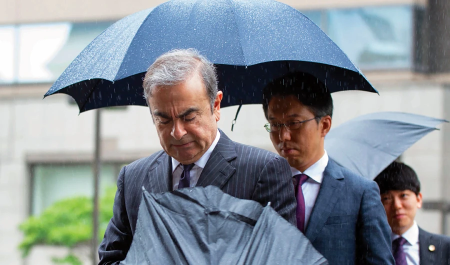 Former Nissan Motor Chairman Carlos Ghosn arrives for a pretrial hearing at the Tokyo District Court. (AFP/File)