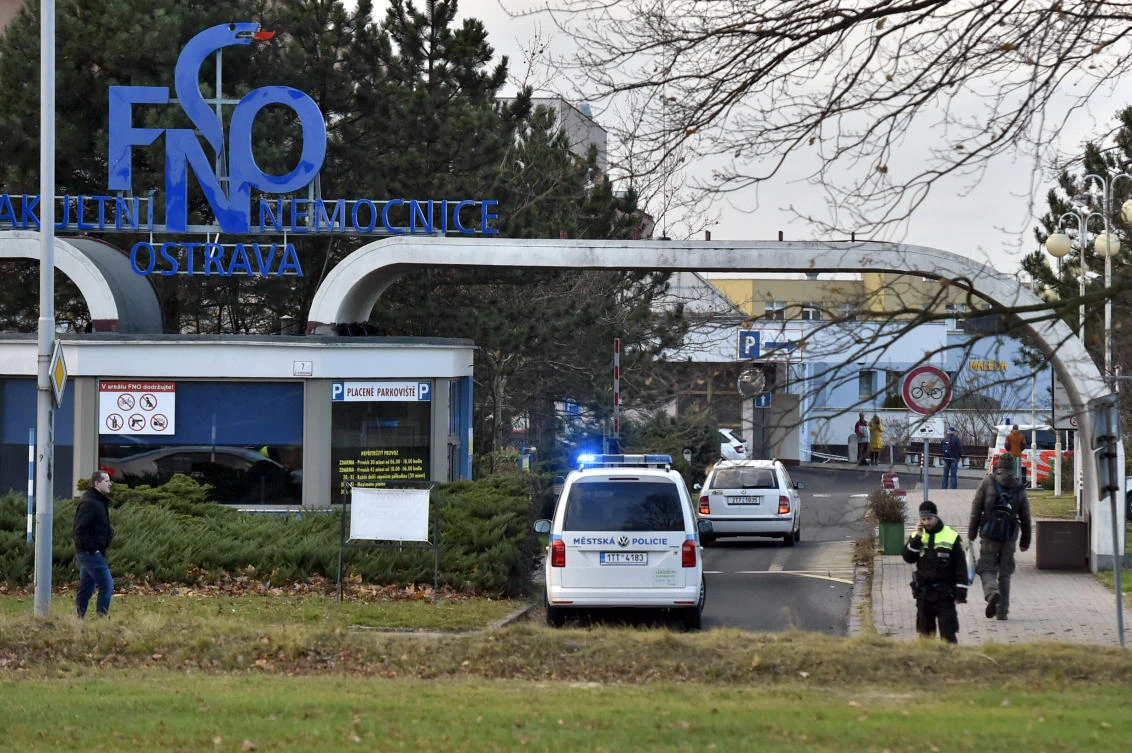 Police car enters an area of the Ostrava Teaching Hospital after a shooting incident in Ostava, Czech Republic, Tuesday, Dec. 10, 2019. (AP)
