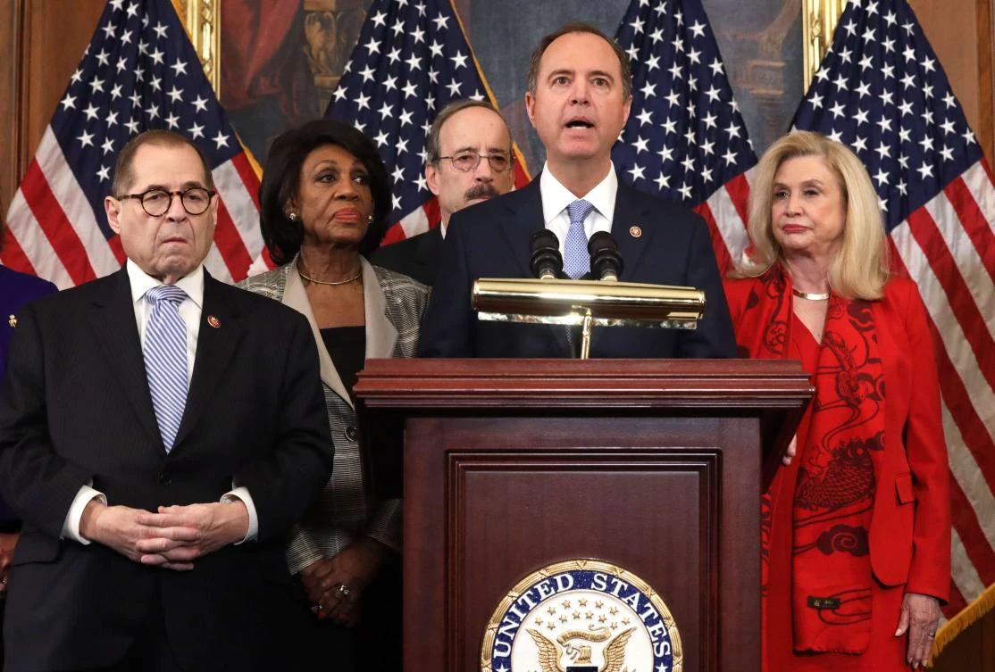 Democrats announce two impeachment charges against Trump