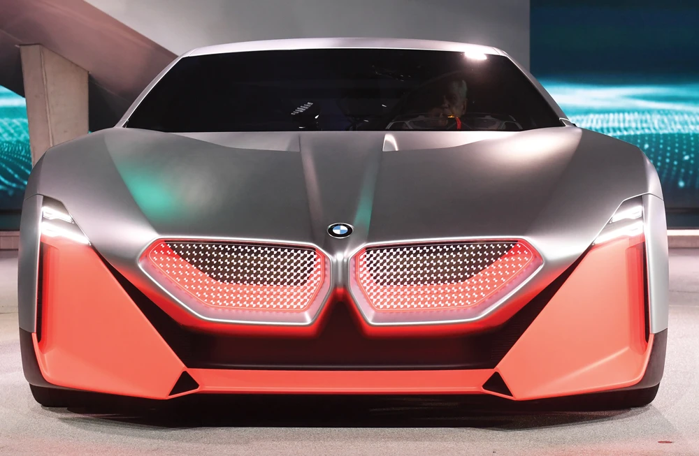 A concept vehicle is revealed at a BMW event in Munich. BMW — like other German carmakers — is planning a slew of all-electric and hybrid models. (AFP)