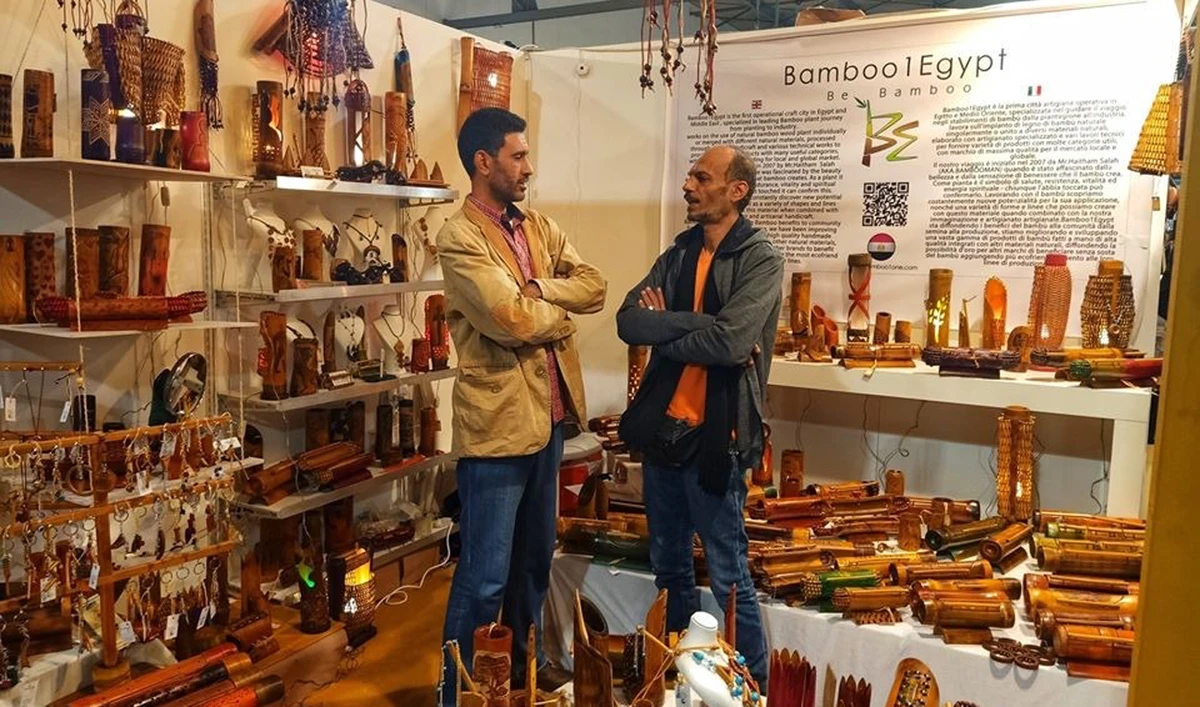 Usama Ghazali, left, with his prized collection of handcrafts and antiquities.