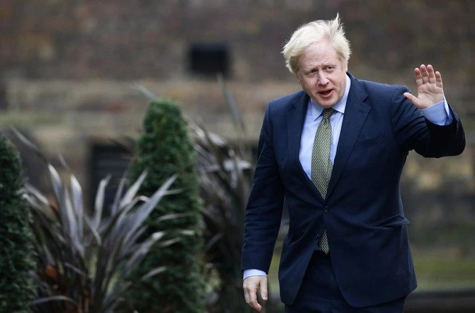 Britain's Prime Minister Boris Johnson waves as he arrives at Downing Street after meeting with the Queen at Buckingham Palace in London, Britain, December 13, 2019. (Reuters/ File Photo)