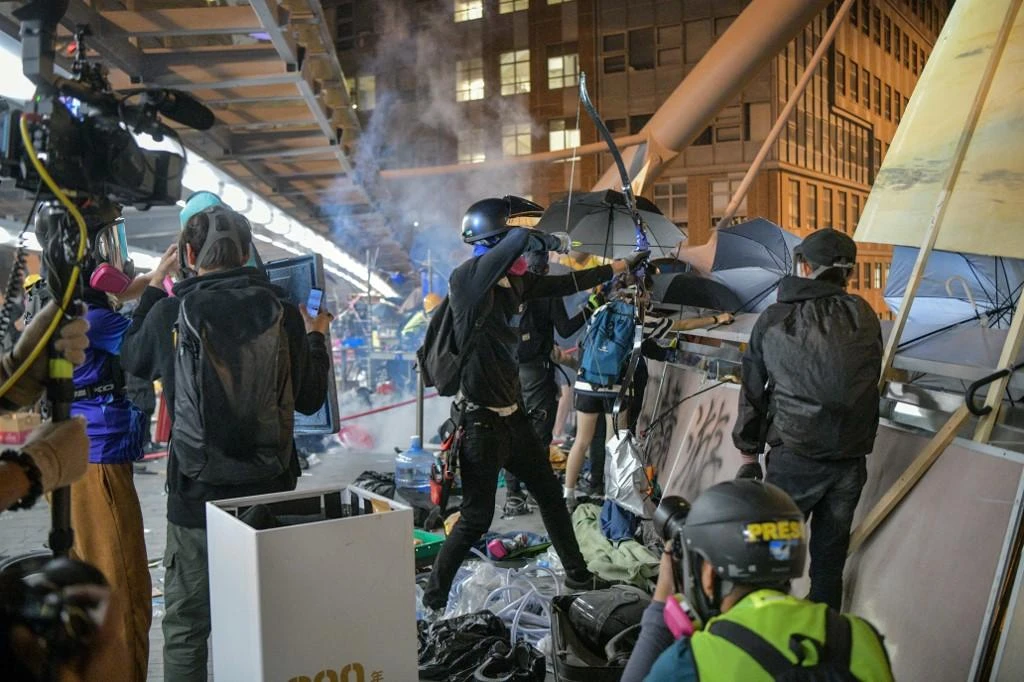 Some protesters in Hong Kong have increasingly resorted to violence since mass demonstrations began in June. (AFP)