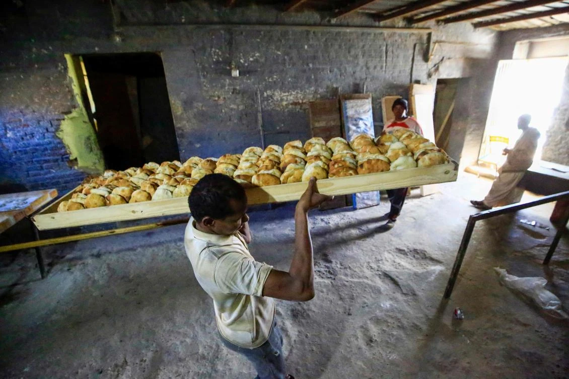 In December 2018, authorities raised the official price of a 70-gram loaf from one Sudanese pound to three, prompting a rush on bakeries and long queues for bread. (AFP)