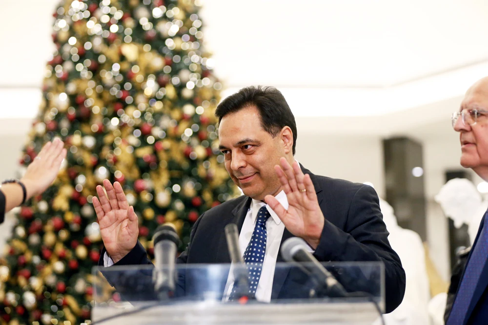 Hassan Diab arrives to talk to the media after being named Lebanon's new prime minister, at the presidential palace in Baabda, Lebanon, on Dec. 19, 2019. (REUTERS/Mohamed Azakir)