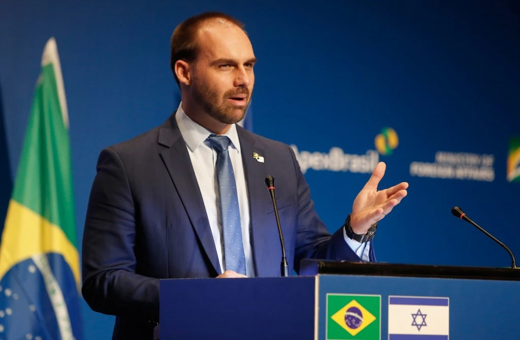 Brazilian Federal Deputy Eduardo Bolsonaro speaks during the opening ceremony of the Brazilian Ministry Trade And Investment Promotion Agency in Jerusalem on December 15, 2019. (AFP)