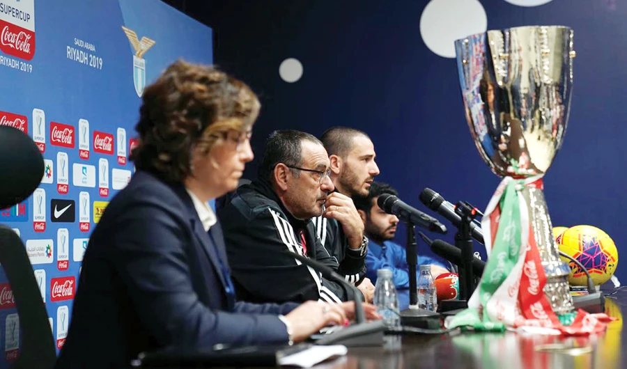 Juventus coach Maurizio Sarri and defender Leonardo Bonucci address the media. (AN photo)