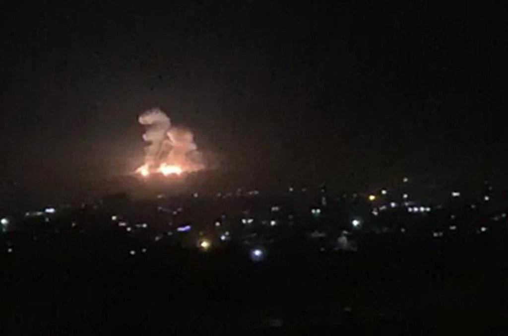 An Israeli strike on November 20 on the outskirts of Damascus, above, killed 21 pro-regime fighters including 16 foreigners, along with two civilians, according to the Observatory. (AFP)