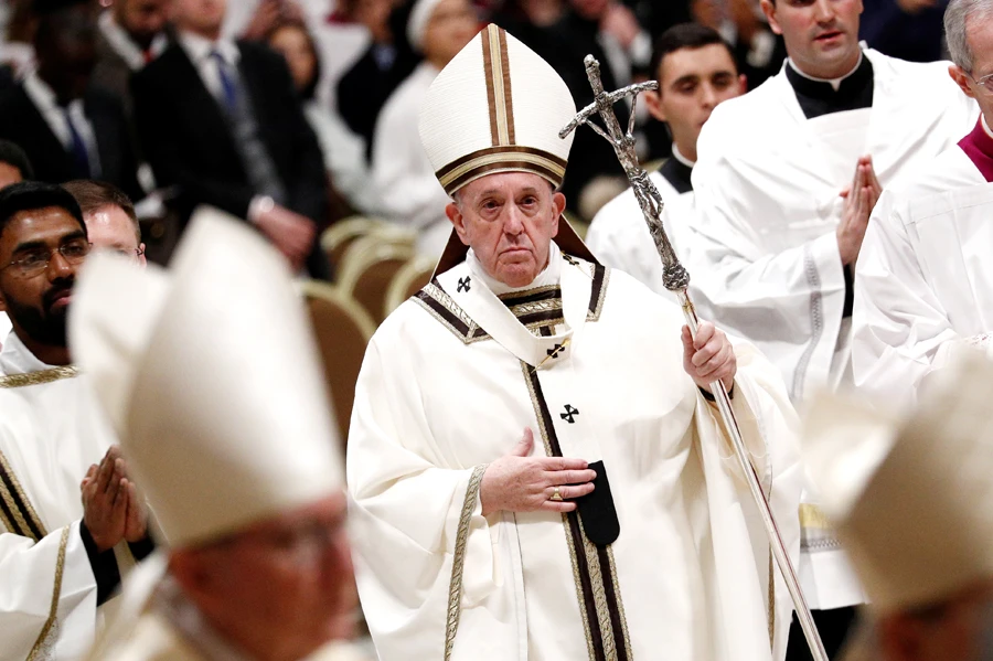 Pope Francis leaves after the Christmas Eve mass in St. Peter's Basilica at the Vatican, December 24, 2019. (Reuters)