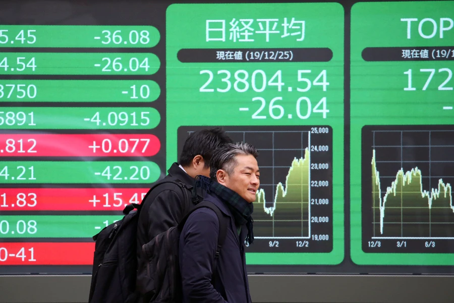 Japan stocks lose steam but still near 14-month peak