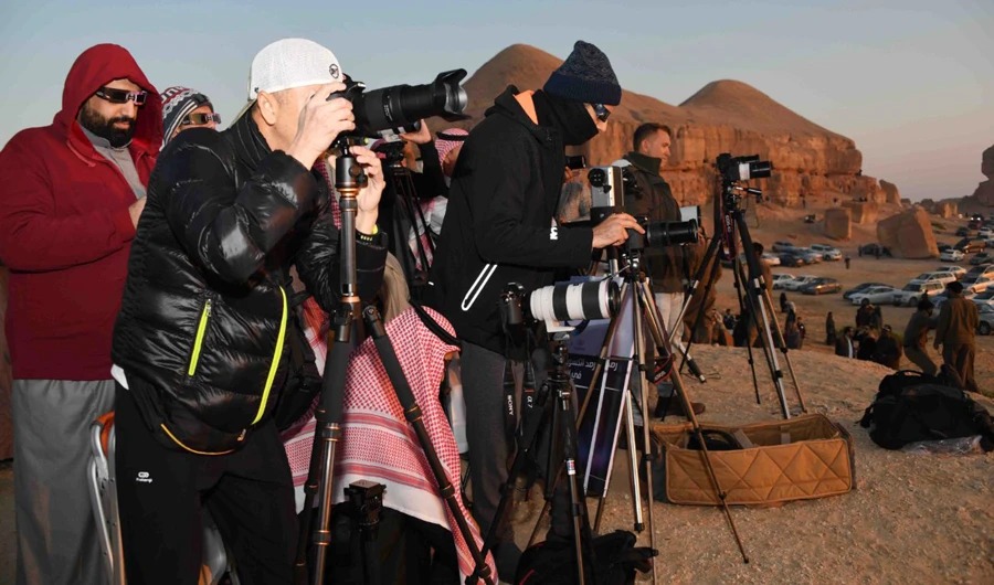 Crowds gather in Saudi Arabia to view rare solar eclipse