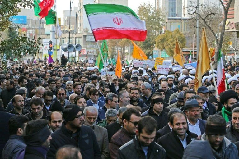 Turmoil at memorial for man killed in Iran protests